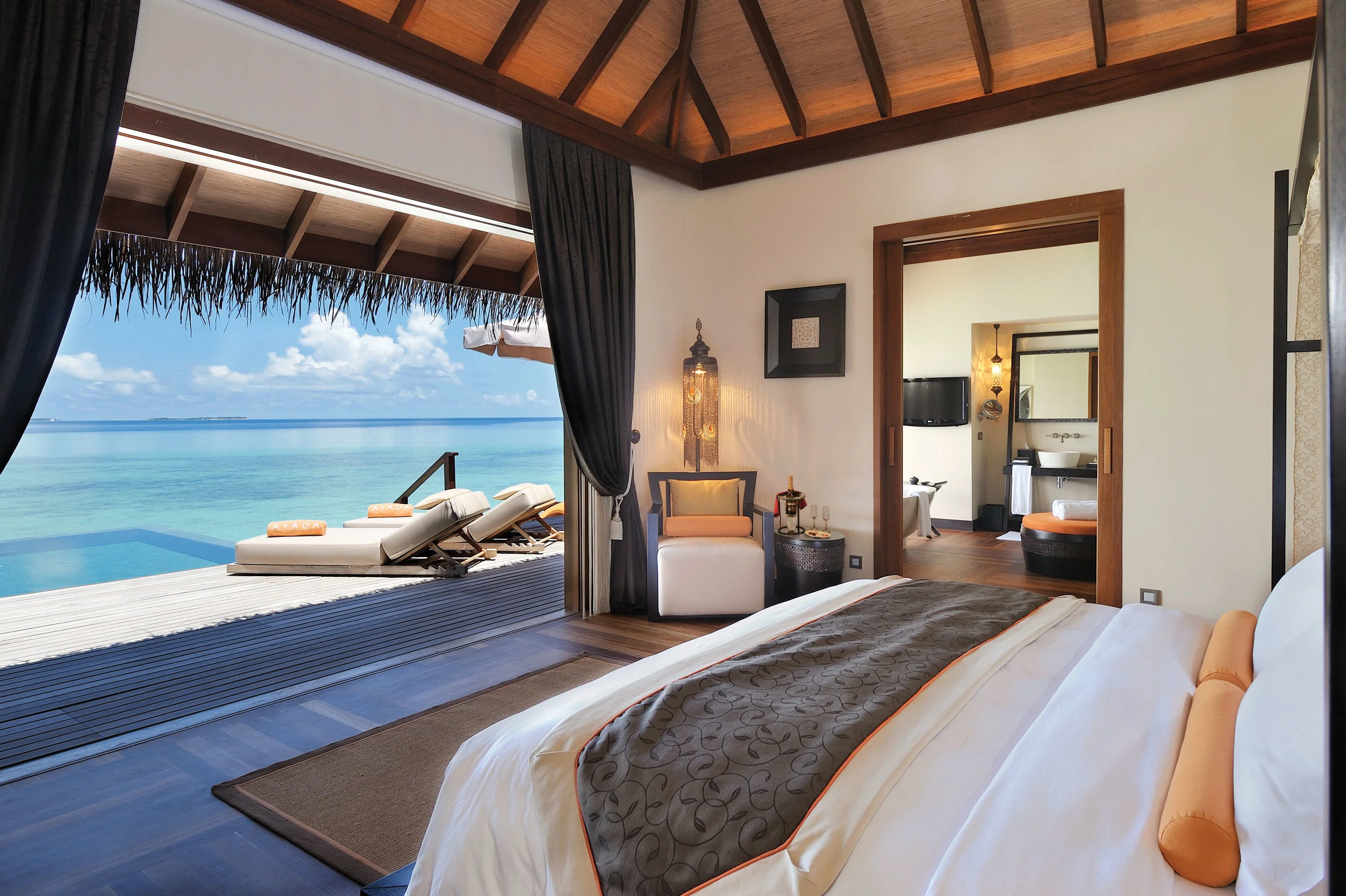 Sunset Ocean Suite with Pool · One bedroom · over-water sunset